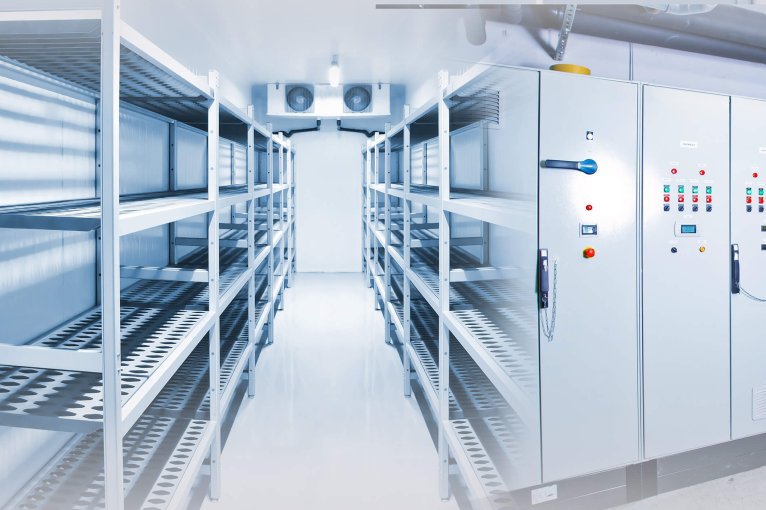 Refrigeration chamber for food storage. Control panels of the refrigerator. Concept - sale of freezing equipment. Equipment for food storage. Cooling. Industrial cold store with empty counters